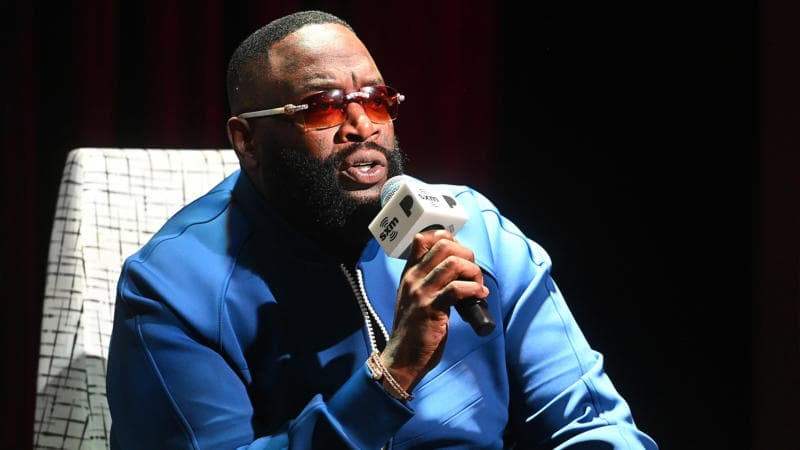 Rick Ross Expresses Interest In The 76ers After Michael Rubin Announces He's Selling His Minority Stake: 'I'll Buy His 10%' Rick Ross Expresses Interest In The 76ers After Michael Rubin Announces He's Selling His Minority Stake: 'I'll Buy His 10%'